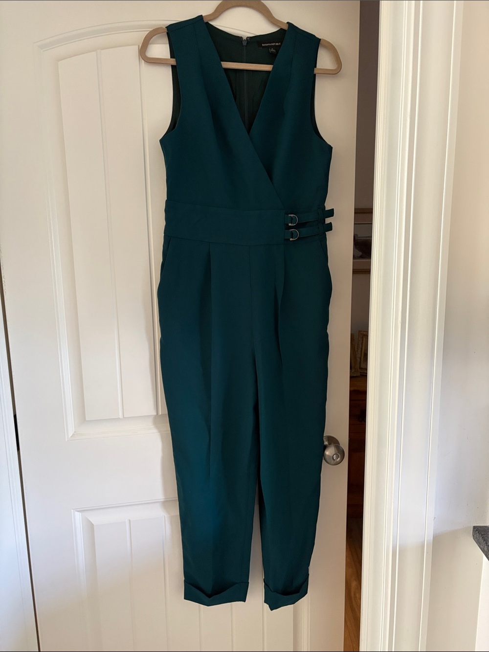 Brand new jumpsuit-never worn but no tags-it’s a pretty teal color